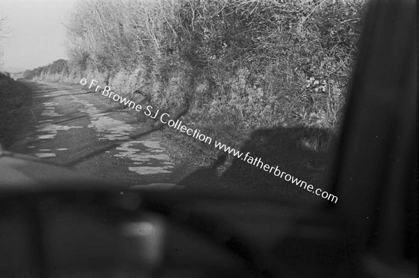 VIEW OF ROAD THROUGH CAR WINDSCREEN